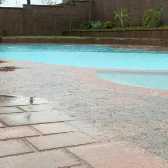 What To Do if Your Pool is Overflowing Overflowing Pool 554x554